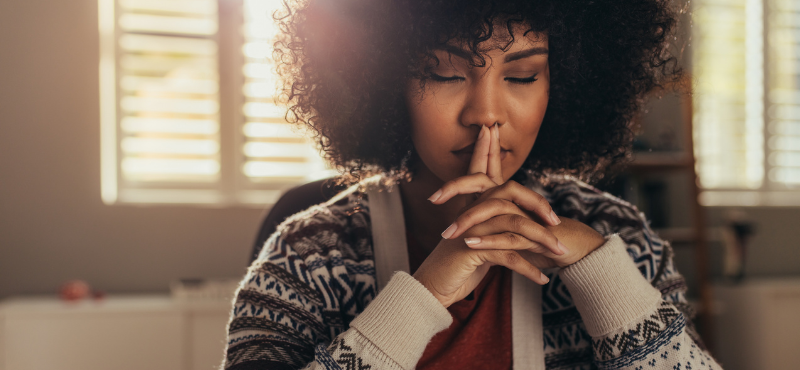 Black woman practicing mindfulness